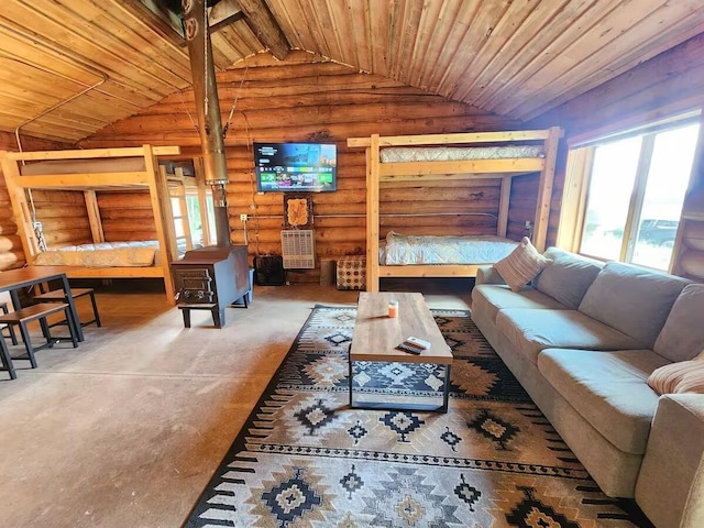 2599 N Pine Ave, White Cloud, MI 49349 - living area featuring vaulted ceiling, plenty of natural light, log walls, and wood ceiling