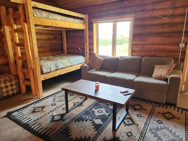 2599 N Pine Ave, White Cloud, MI 49349 - living room featuring log walls
