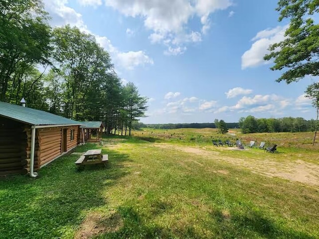 2599 N Pine Ave, White Cloud, MI 49349 - view of green lawn featuring a view of rural / pastoral area and an outdoor structure