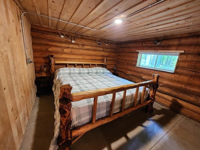 2599 N Pine Ave, White Cloud, MI 49349 - bedroom featuring concrete floors and wooden ceiling