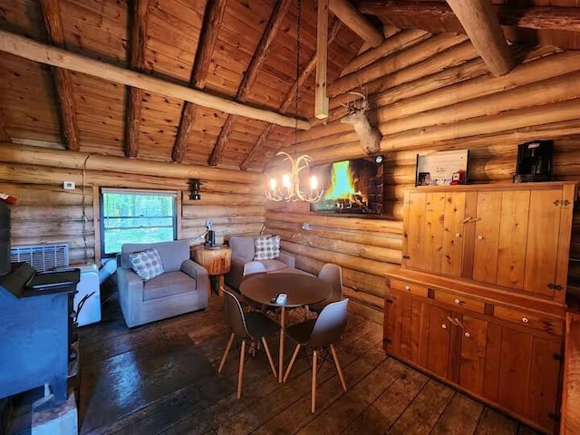 2599 N Pine Ave, White Cloud, MI 49349 - dining area featuring wood ceiling, dark wood-style flooring, rustic walls, and a chandelier