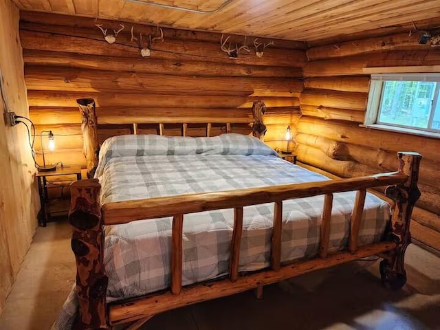 2599 N Pine Ave, White Cloud, MI 49349 - bedroom featuring wood ceiling and log walls