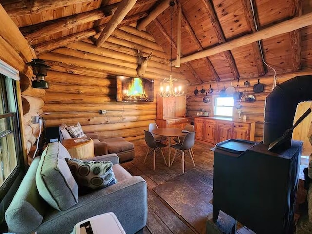 2599 N Pine Ave, White Cloud, MI 49349 - living area with wood ceiling, rustic walls, a chandelier, and wood-type flooring