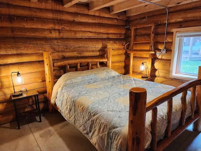 2599 N Pine Ave, White Cloud, MI 49349 - bedroom with log walls