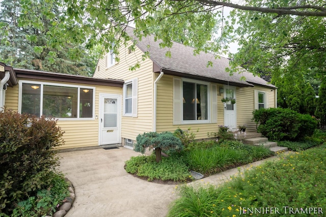 4001 Hillsdale Ave NE, Grand Rapids, MI 49525 - view of front of property featuring roof with shingles