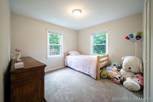 4001 Hillsdale Ave NE, Grand Rapids, MI 49525 - carpeted bedroom with multiple windows