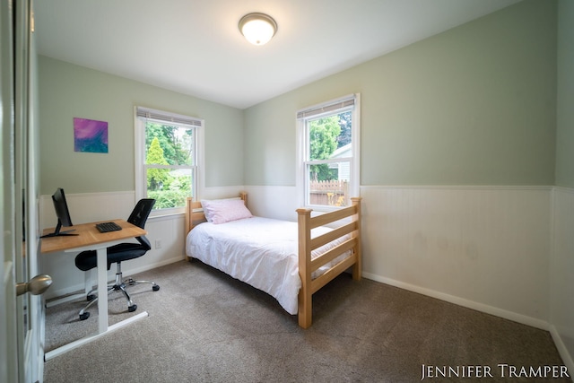4001 Hillsdale Ave NE, Grand Rapids, MI 49525 - carpeted bedroom with a wainscoted wall and an office area