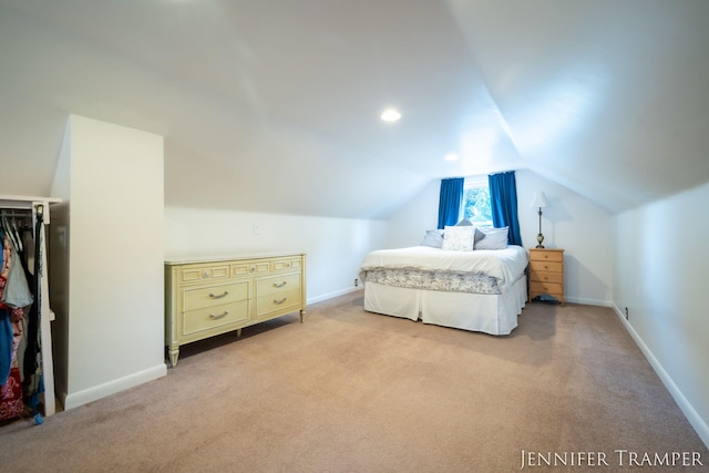 4001 Hillsdale Ave NE, Grand Rapids, MI 49525 - carpeted bedroom with lofted ceiling and baseboards