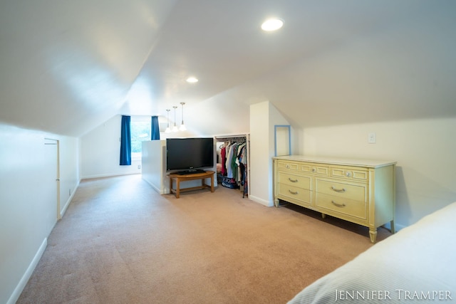 4001 Hillsdale Ave NE, Grand Rapids, MI 49525 - bedroom featuring vaulted ceiling, light colored carpet, recessed lighting, and a spacious closet