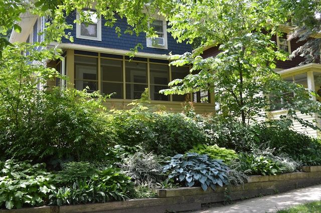 501 W Mosley St, Ann Arbor, MI 48103 - back of house featuring a sunroom