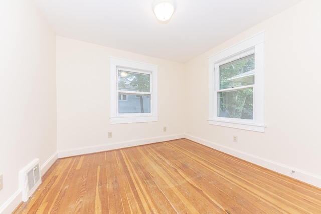 501 W Mosley St, Ann Arbor, MI 48103 - empty room with light wood finished floors and baseboards