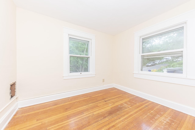 501 W Mosley St, Ann Arbor, MI 48103 - spare room with light wood finished floors and baseboards