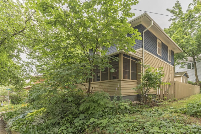 501 W Mosley St, Ann Arbor, MI 48103 - view of home's exterior featuring a sunroom