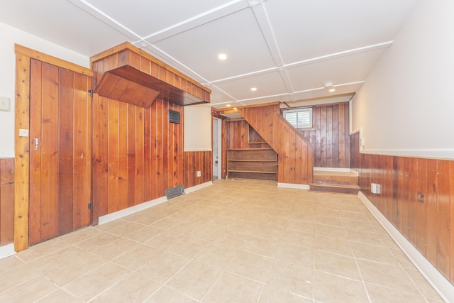 501 W Mosley St, Ann Arbor, MI 48103 - below grade area featuring wooden walls, stairs, recessed lighting, and a wainscoted wall