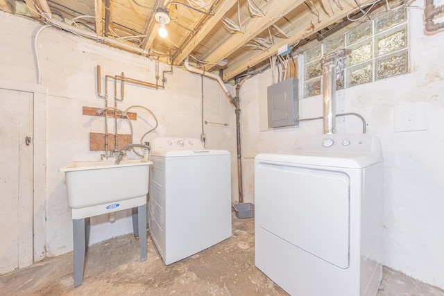 501 W Mosley St, Ann Arbor, MI 48103 - washroom with electric panel and washer and clothes dryer