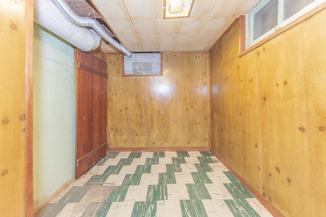 501 W Mosley St, Ann Arbor, MI 48103 - finished basement featuring tile patterned floors and wooden walls