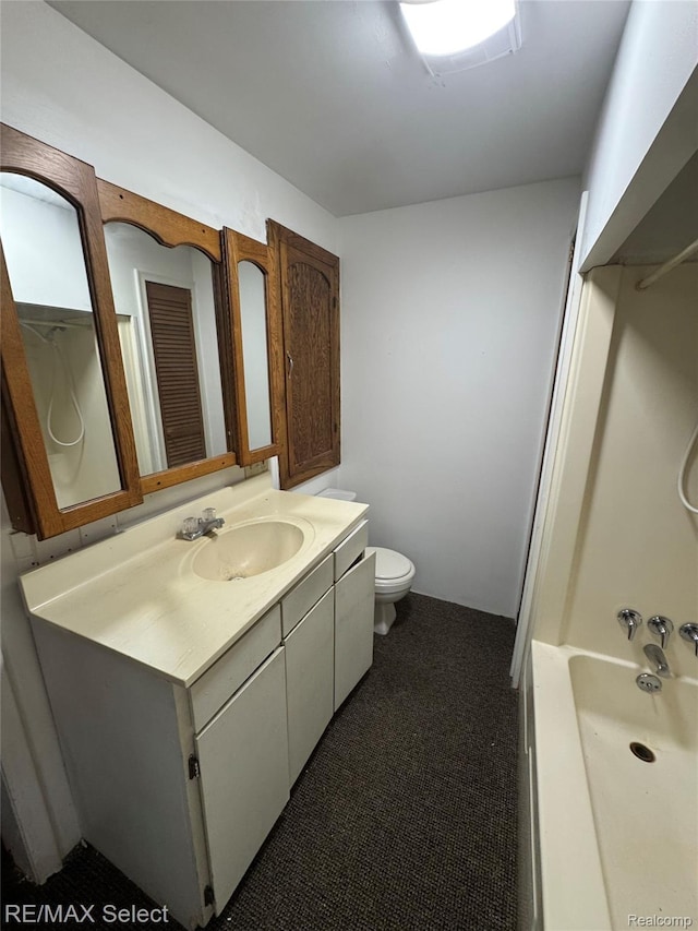 3605 Hogarth Ave, Flint, MI 48532 - bathroom with vanity and toilet