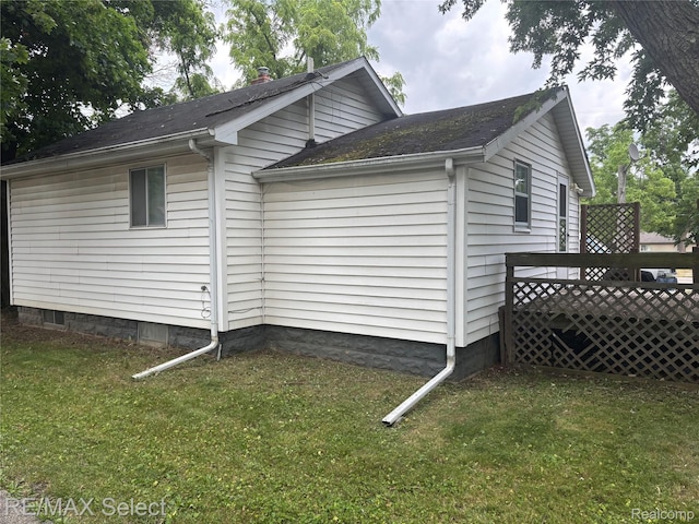 3605 Hogarth Ave, Flint, MI 48532 - view of property exterior featuring a yard and a deck