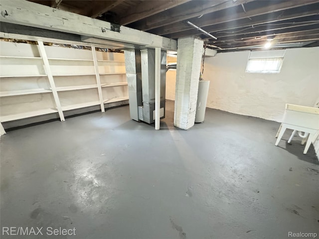 3605 Hogarth Ave, Flint, MI 48532 - basement with heating unit and water heater