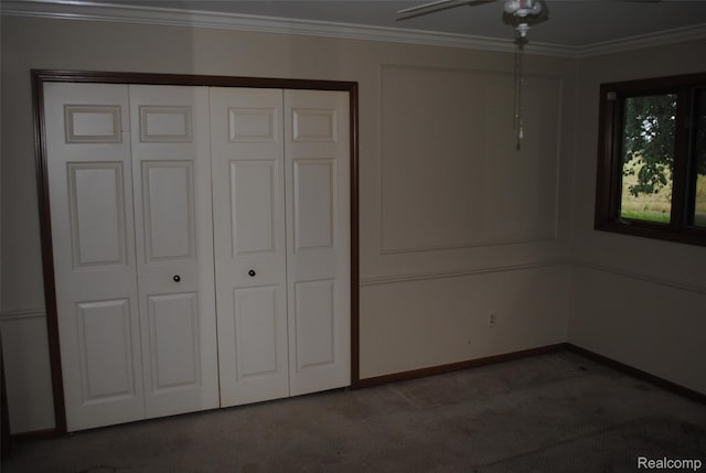 4785 Mayer Rd, China, MI 48054 - unfurnished bedroom featuring carpet floors, crown molding, and a closet