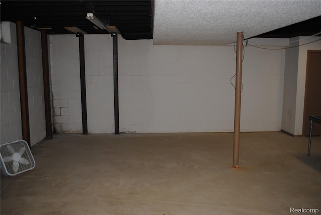 4785 Mayer Rd, China, MI 48054 - finished below grade area featuring concrete block wall