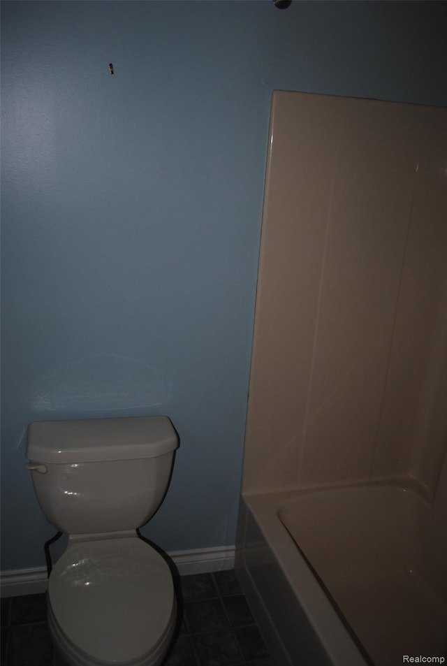 4785 Mayer Rd, China, MI 48054 - bathroom with tile patterned floors and washtub / shower combination