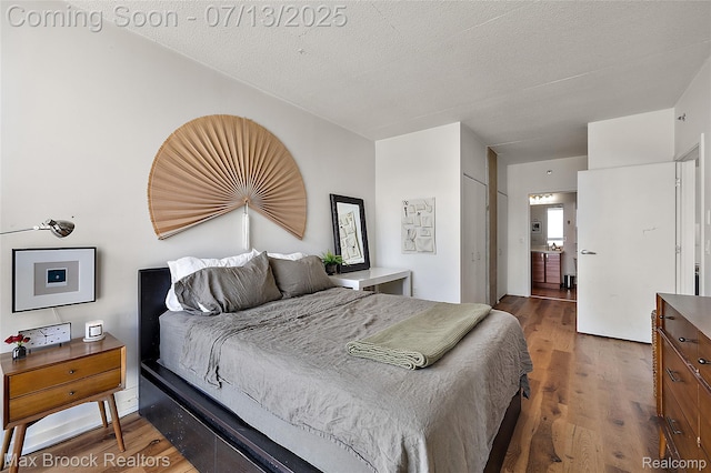 432 S Washington Ave Unit 1402, Royal Oak, MI 48067 - bedroom with wood finished floors