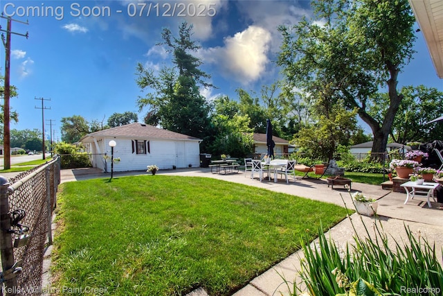 20310 Burt Rd, Detroit, MI 48219 - back of property with a patio, a fenced backyard, and a fire pit