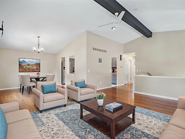 890 Darwin Place Ct, Rochester Hills, MI 48307 - living room with a chandelier, wood finished floors, and ceiling fan