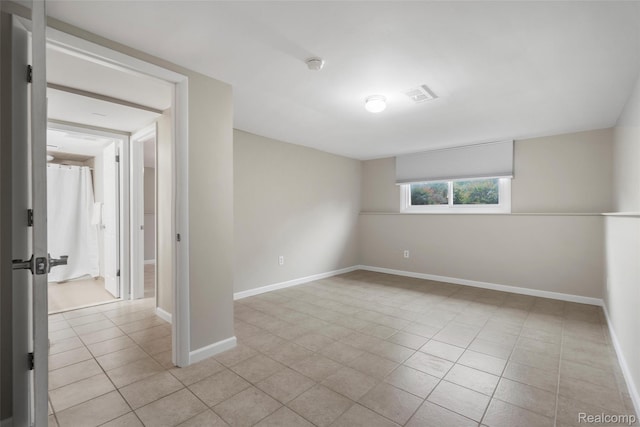 890 Darwin Place Ct, Rochester Hills, MI 48307 - empty room with light tile patterned floors and a smoke detector