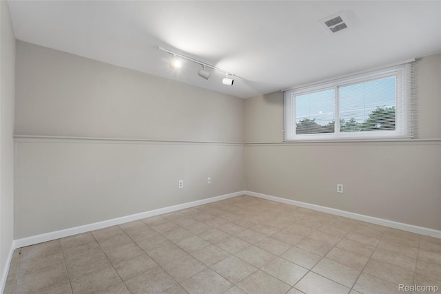 890 Darwin Place Ct, Rochester Hills, MI 48307 - empty room with track lighting and baseboards