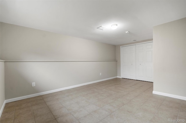 890 Darwin Place Ct, Rochester Hills, MI 48307 - unfurnished bedroom featuring baseboards and a closet