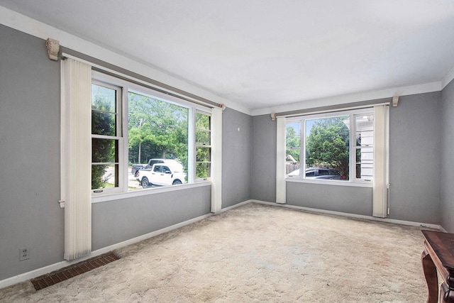 2736 Cascade Rd SE, Grand Rapids, MI 49506 - empty room featuring plenty of natural light and carpet flooring