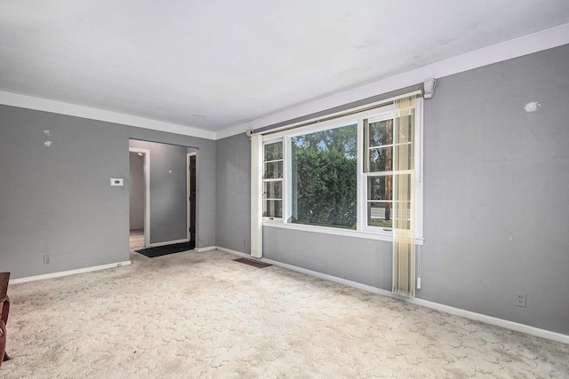 2736 Cascade Rd SE, Grand Rapids, MI 49506 - carpeted spare room featuring baseboards