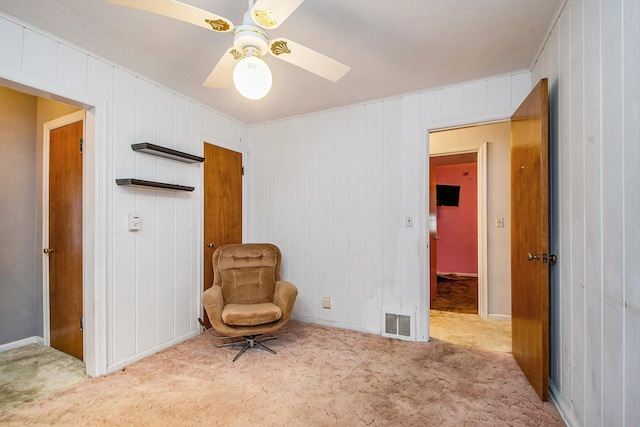 2736 Cascade Rd SE, Grand Rapids, MI 49506 - unfurnished room featuring carpet flooring, ceiling fan, and wood walls
