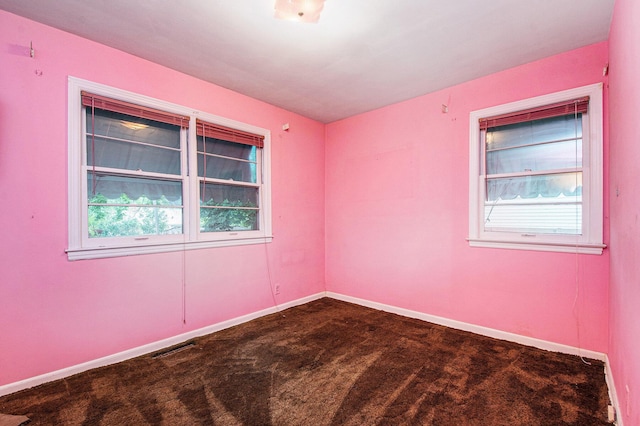 2736 Cascade Rd SE, Grand Rapids, MI 49506 - carpeted empty room with healthy amount of natural light