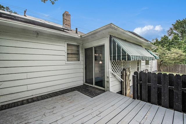 2736 Cascade Rd SE, Grand Rapids, MI 49506 - wooden deck with a sunroom
