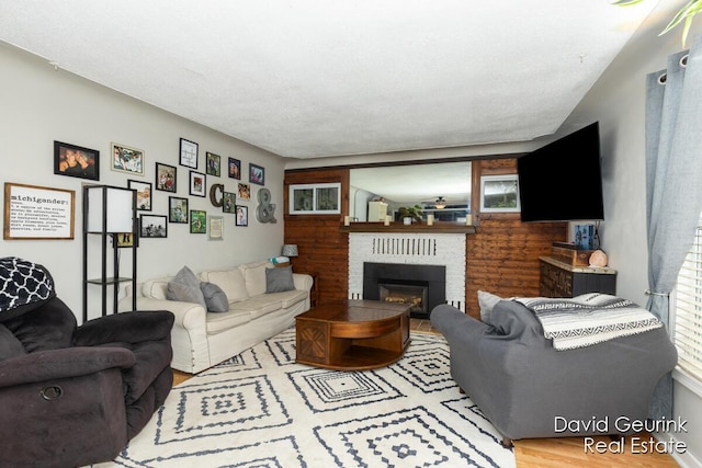 730 S 160th Ave, Holland, MI 49423 - living room with a fireplace and wood finished floors