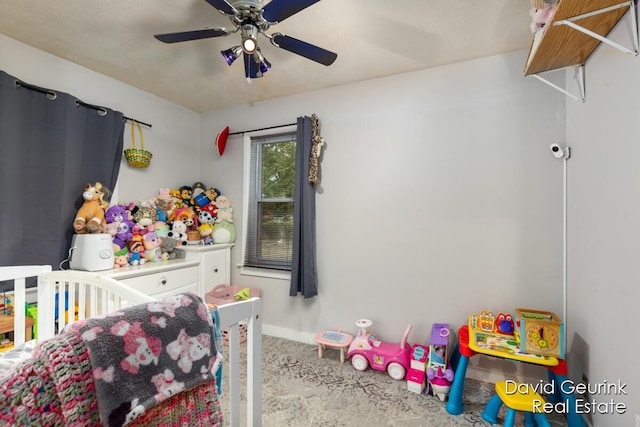 730 S 160th Ave, Holland, MI 49423 - carpeted bedroom with a crib and a ceiling fan