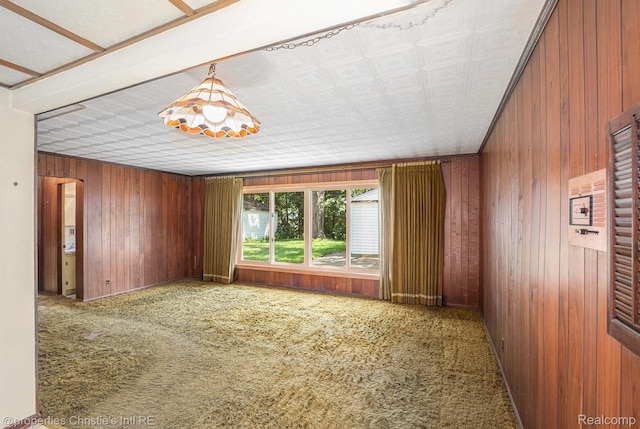 1014 Key W Dr, Clawson, MI 48017 - unfurnished room with wooden walls and carpet