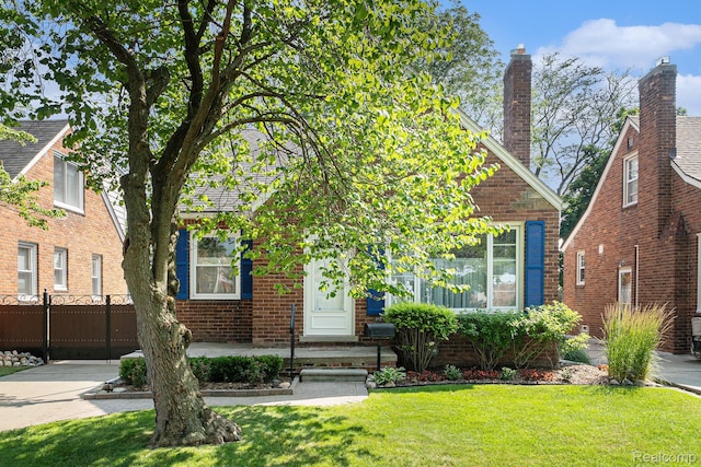 20874 Woodmont St, Harper Woods, MI 48225 - view of front facade featuring brick siding