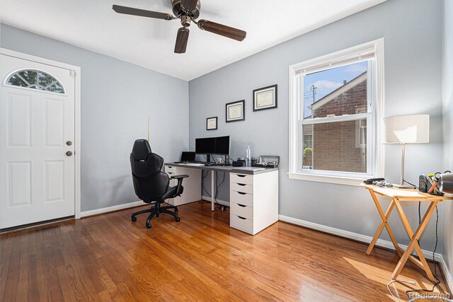 20874 Woodmont St, Harper Woods, MI 48225 - home office with light wood-style flooring and ceiling fan