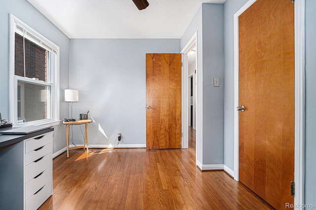 20874 Woodmont St, Harper Woods, MI 48225 - unfurnished office featuring wood finished floors and ceiling fan