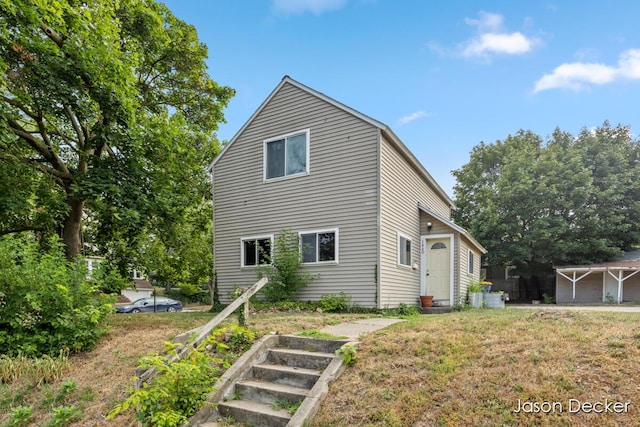 1440 College Ave NE, Grand Rapids, MI 49505 - rear view of property with entry steps