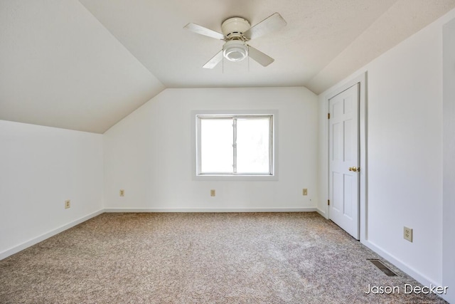 1440 College Ave NE, Grand Rapids, MI 49505 - additional living space featuring carpet floors, lofted ceiling, and a ceiling fan