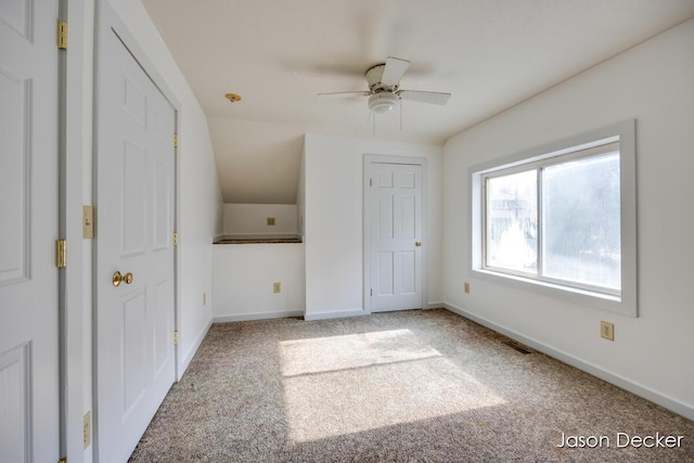 1440 College Ave NE, Grand Rapids, MI 49505 - unfurnished bedroom with carpet flooring and ceiling fan