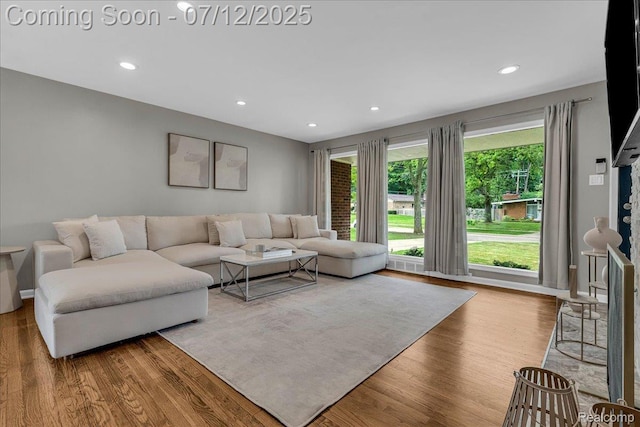 19425 Butternut Ln, Southfield, MI 48076 - living room with wood finished floors and recessed lighting