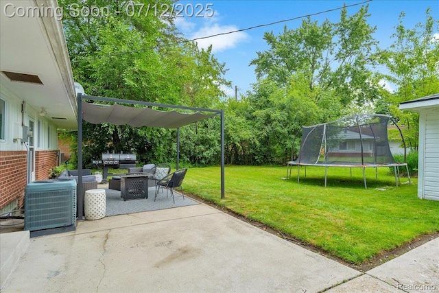 19425 Butternut Ln, Southfield, MI 48076 - view of patio / terrace with a trampoline and an outdoor hangout area