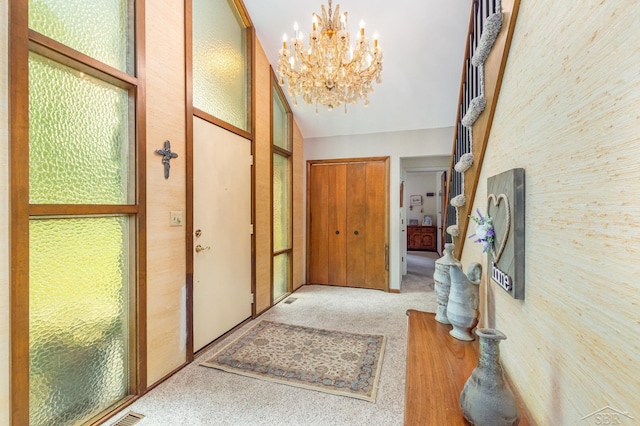 859 Foxboro Rd, Saginaw, MI 48638 - foyer featuring a chandelier and carpet floors