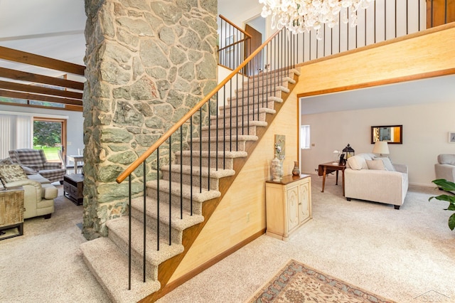 859 Foxboro Rd, Saginaw, MI 48638 - stairs featuring carpet flooring, a chandelier, and a towering ceiling